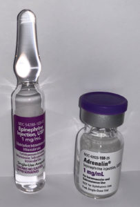 Figure 1: Single-use vial on right of image contains sulfite. Ampule on left of image is preservative-free and without sulfite.