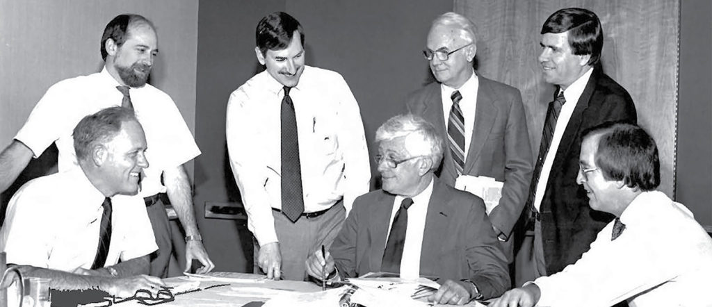 1986 – Reviewing the first issue of the APSF Newsletter, L-R: Burton Dole, Treasurer; Jeffrey Cooper, PhD, Executive Committee (EC); John Eichhorn, MD, Editor; Jeep Pierce, MD President; J.S. Gravenstein, MD, EC; James Holzer, EC; Dekle Roundtree, Vice President.