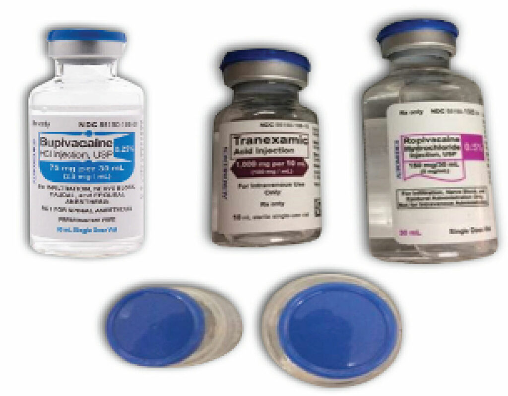 Figure 2: Look-alike vials of tranexamic acid, ropivacaine, and bupivacaine. While label colors and vial sizes are different, the caps are blue and if stored upright, may lead to selecting a vial based on cap color. (Used with permission from ISMP).<sup>8</sup>