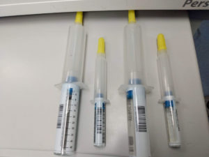 Figure 1 – prefilled syringes with labels facing downwards