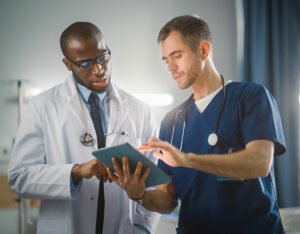 Doctors Engaged in a Perioperative Handoff