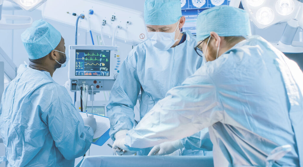 Anesthesiologist Monitoring Blood Pressure